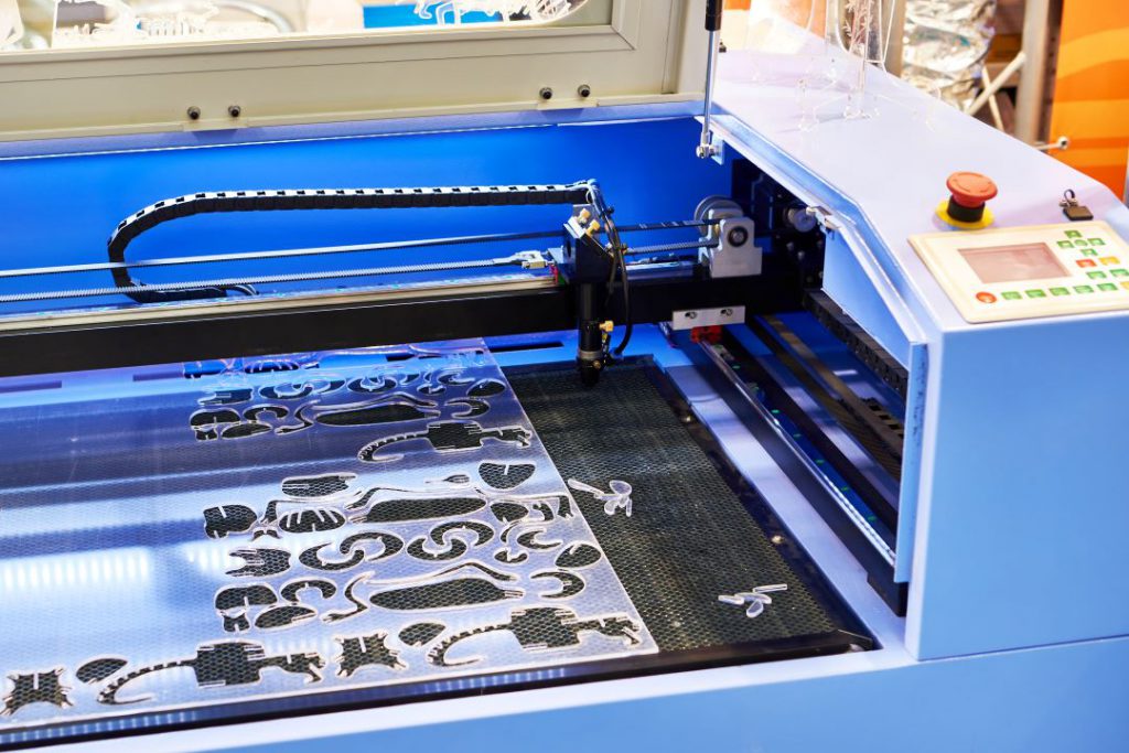 Image of laser machine cutting acrylic material